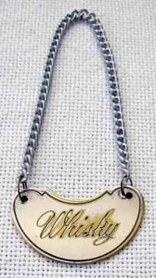 Old Silver Plated Whisky Shield Label. Size: 3.1 x 5.3 cm. (1.2 x 2 inches)