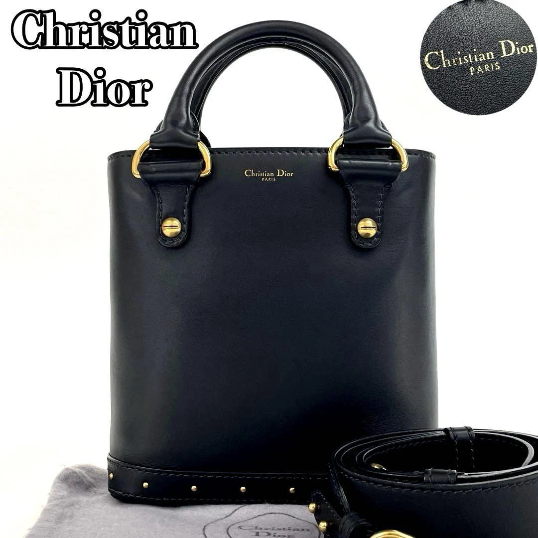 Sac à main Dior 2 voies clous or quincaillerie cuir noir