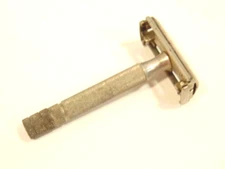 older Gillette safety razor;  marked X-4 on back of shaving head