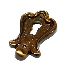 BOCCHETTA PIASTRINA PER MOBILI ZAMA PATINATA MM. 33X50 CON FORO CHIAVE BRONZO