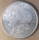 1921 D Morgan Silver Dollar Appears Brilliant Uncirculated.