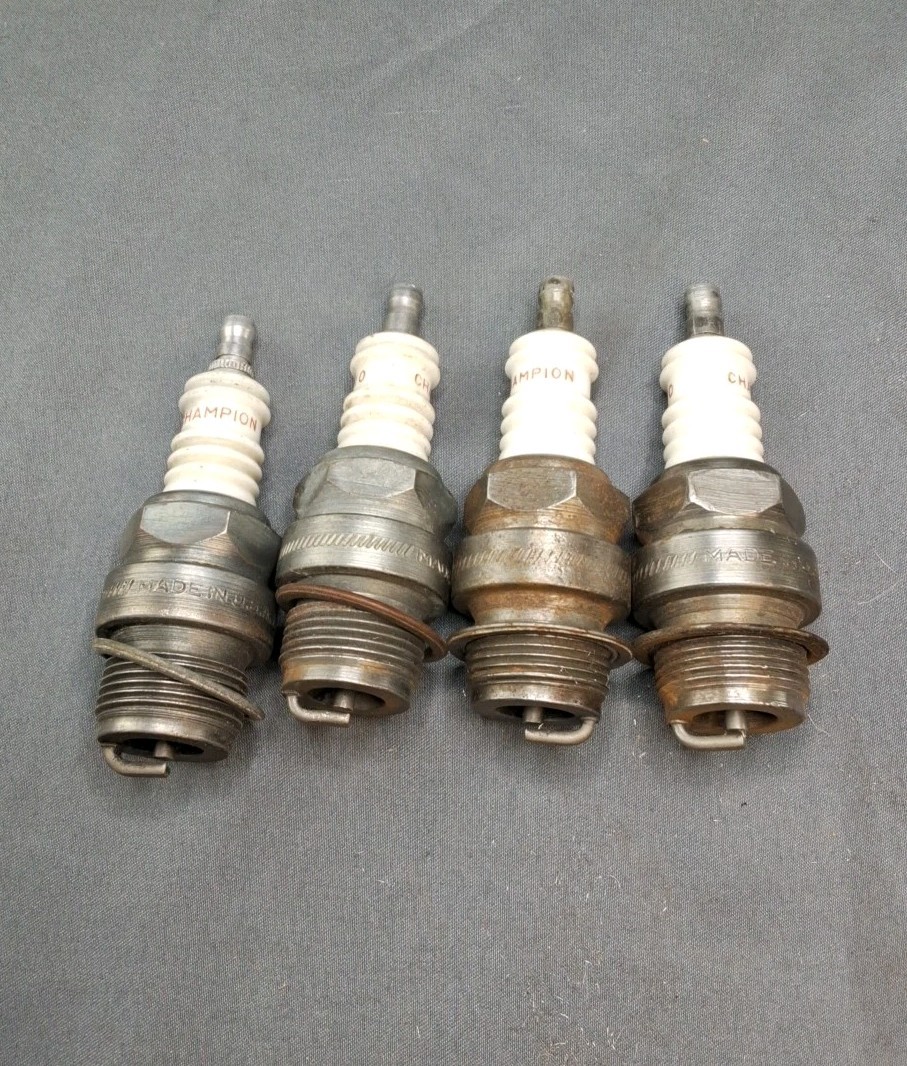 4 Champion W-10 Spark Plugs  Used, Clean, Good