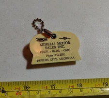 Vtg Minelli Motor Sales Chevrolet Olds GMC Rogers City MI Coin Holder Keychain