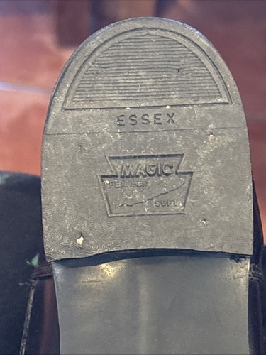 Black leather Essex Magic W9500 riding boot with embossed logo and “USA Made” text on heel.