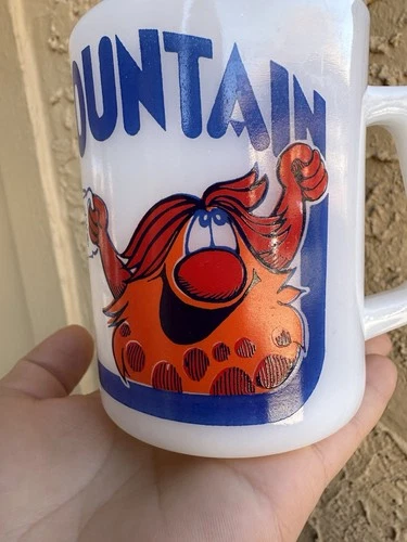 Vintage Colorful Magic Mountain Troll milk glass coffee mug from the 1970s