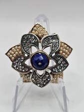 STERLING SILVER FLORAL BROOCH WITH CLEAR RHIN...