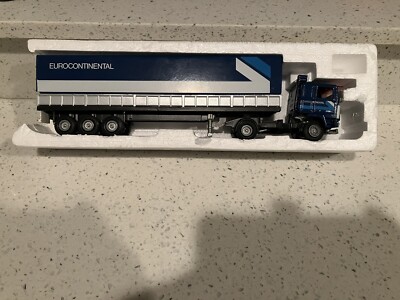 Tekno 1/50 scale Volvo FH04 Globe Container Contrans 'Ocean Traders' housed in a foam-packed plas