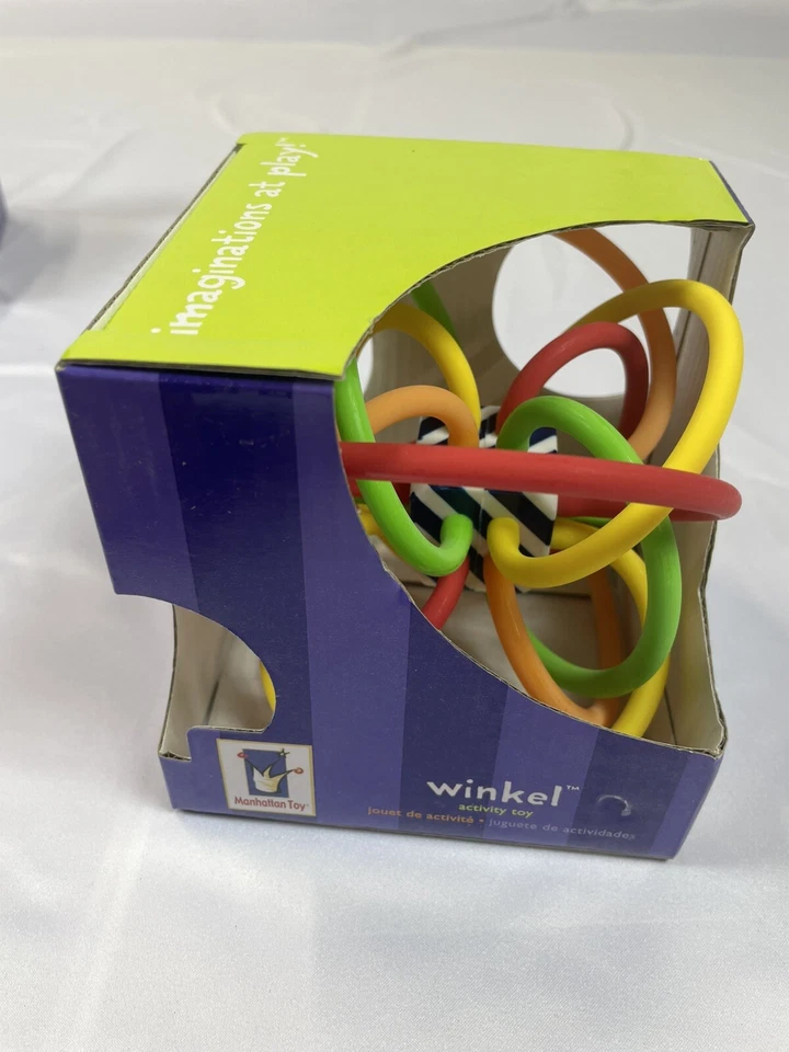 Manhattan Toy Winkel Rattle & Sensory Teether Toy Yellow/Green/Orange/Red - Image 4 of 4