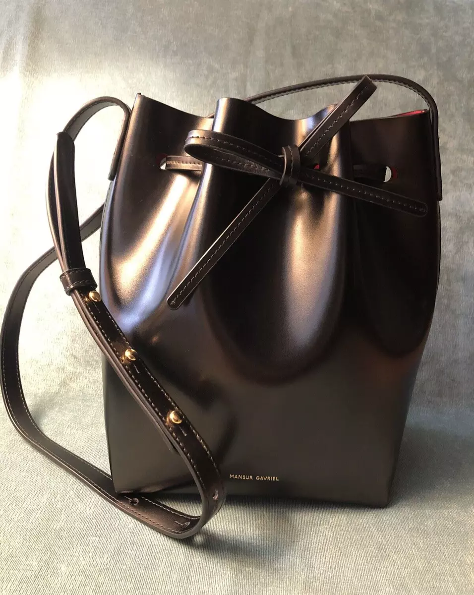 Black bucket bag with red interior deals