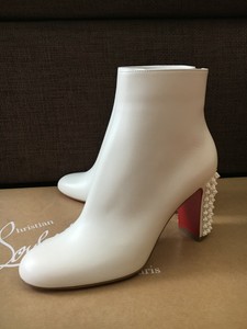 white louboutin boots