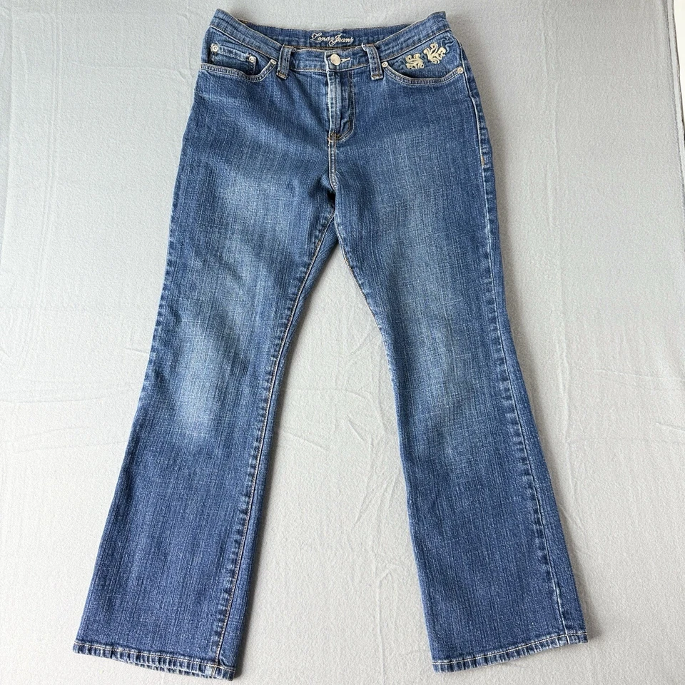Pantalones de mezclilla para mujer Zena con solapa y bolsillo azul lavado medio talla 4 corte bota pequeño Foto 4 de 4