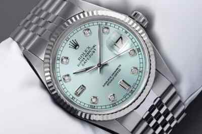 Mens Rolex Datejust 36 mm Ice Blue Diamond Dial Gold Fluted Bezel Steel Watch