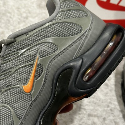 olive green and orange air max plus