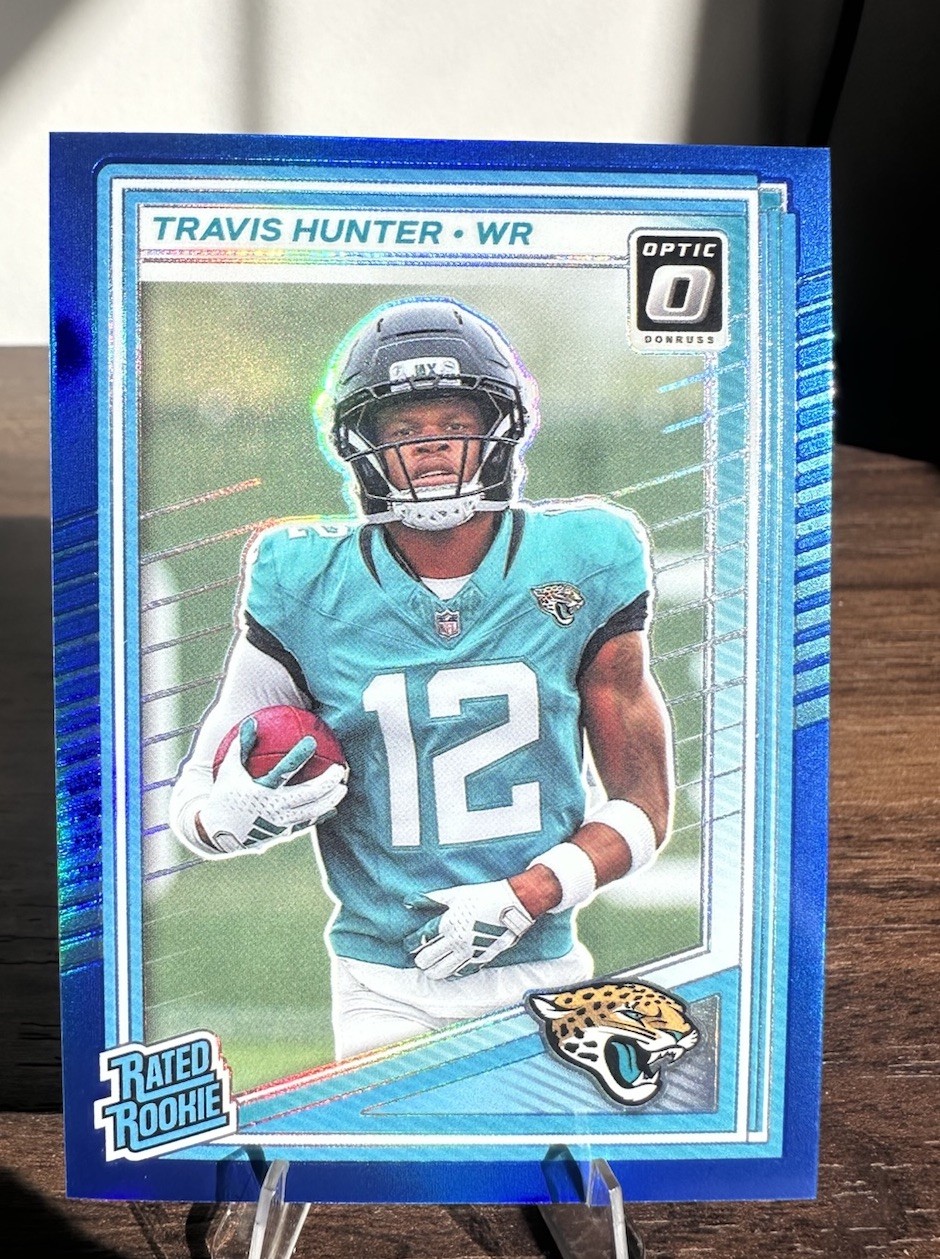 2025 Panini Donruss Optic Travis Hunter RC Blue /249 Rated Rookie #201