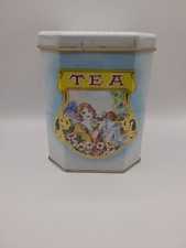Vintage Blue, White & Yellow Tea Cannister with Gold Accents Woman Holding...