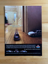 2000 Print Ad AMOCO Toys Police Car vs Speeding Car Hallway Funny