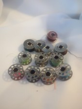 Mixed Lot of 12 Vintage 1 To 10 Hole Metal Sewing Machine Bobbins One plastic