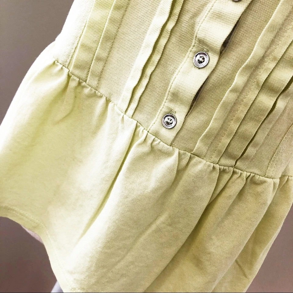Top polo verde peplum Burberry Chartreuse Foto 3 de 4