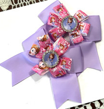 Beautiful Princess Sofia Set of Pigtail hair bows for girls.