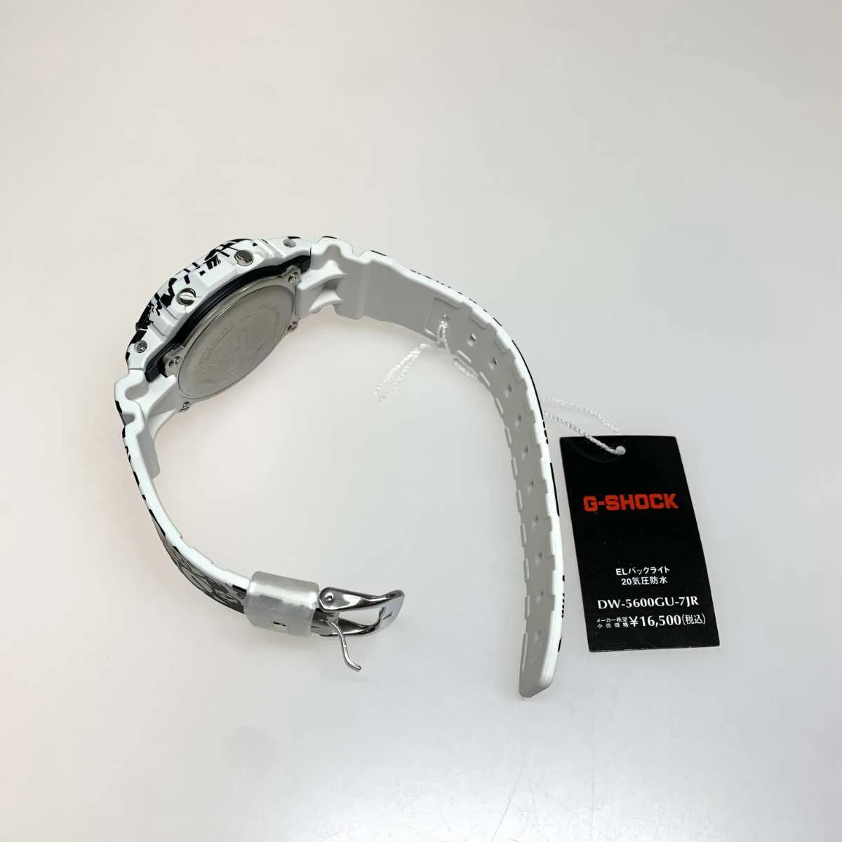 with A Casio watch manual box and CASIO Secondhand DW digital wristwatch 5600GU - vintagewatches.pk