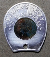 C529 (Torrington CT), McCann’s Lucky 7th Anniversary. Encased 1950D 1c, horsesho