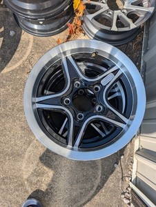 13" x 5" ALUMINUM TRAILER WHEEL 5-LUG ON 4.5 INCHES  - Used GOUGE