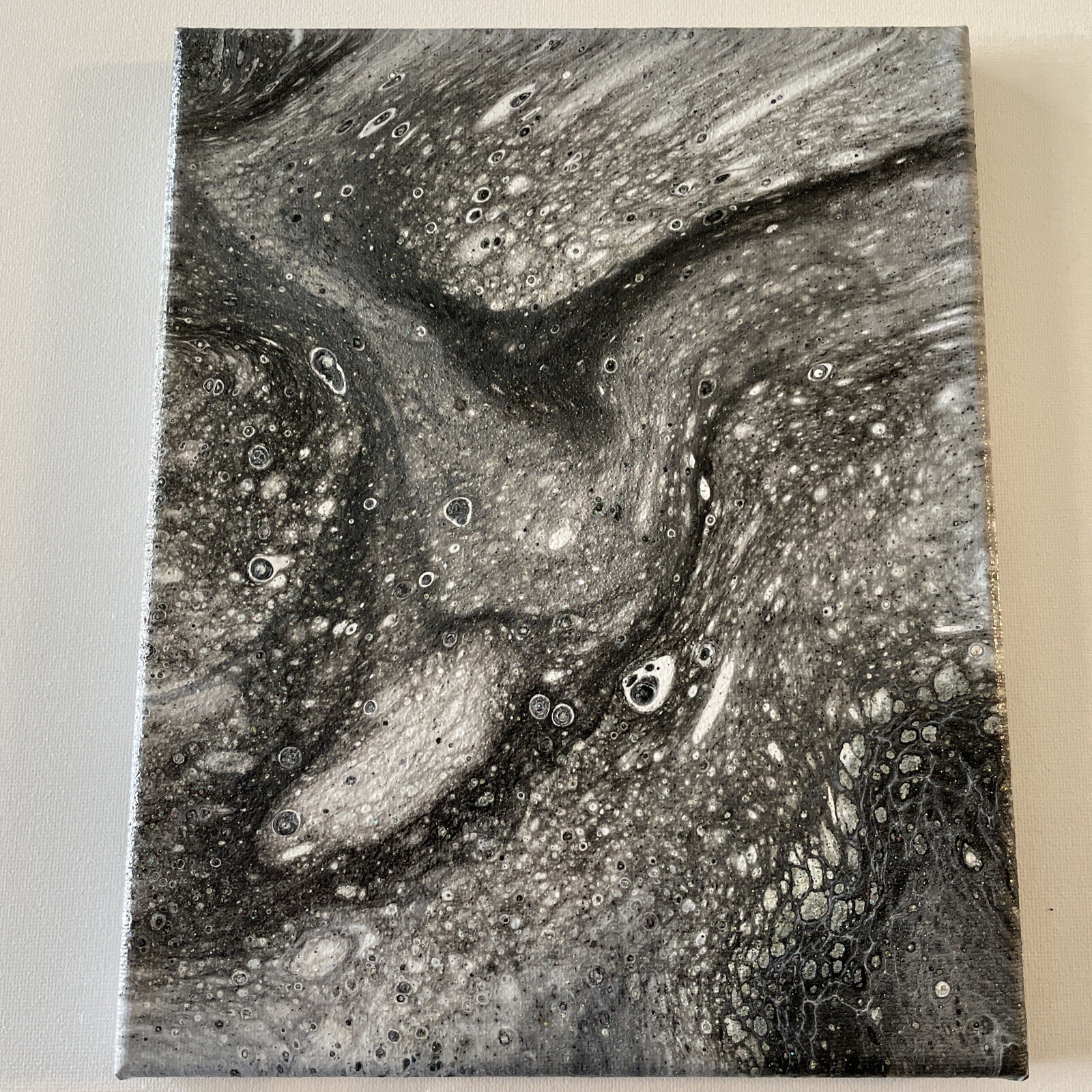 black and white acrylic pour painting