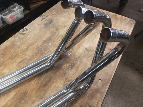 Honda cb750 sohc exhaust system from years ago.  Chopper. Extra ground clearance