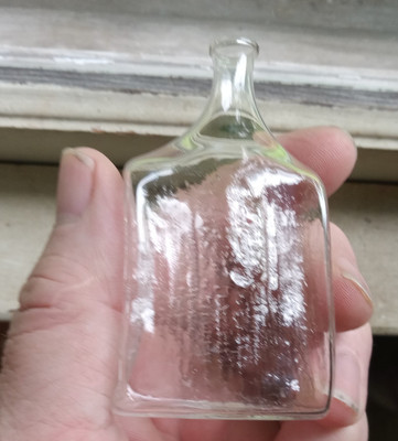 VERY CRUDE FREE BLOWN SMALL COLOGNE BOTTLE WITH SUNKEN  TEXTURED PANELS