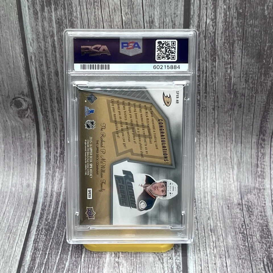 2015-16 UD - SPX - Rookie Fabric Nick Ritchie SPXR-NR - PSA 8 - Image 2 of 2