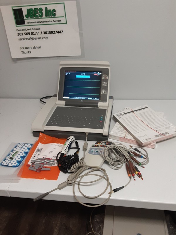 GE MAC 5500 HD EKG , with all  accessories 60 day free waranty and retun incl