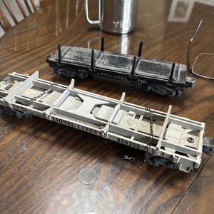 lionel 3461 and 33651  lumber cars Postwar for parts