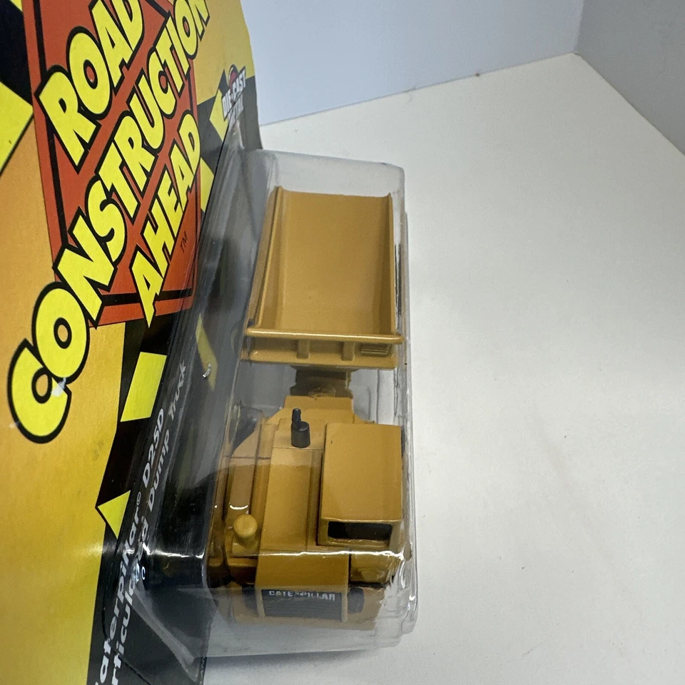 Ertl Road Construction Ahead Die Cast Catepillar D25D Articulated 1:64 Scale New - Image 4 of 4