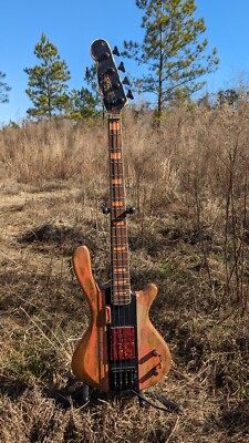 Panick Inc Showcase Bass v2 2023 -  Coral Over Monkeypod with Kahler Tremolo 
