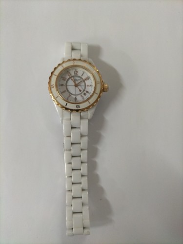 STURHLING 35MM WHITE CERAMIKA RUO WOMEN'S WATCH USED EXCELLENT CONDITION.
