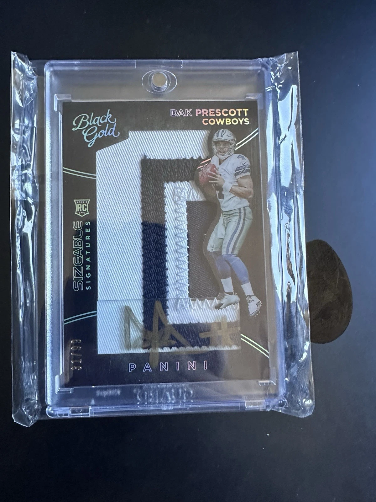 Dak Prescott Panini Black Gold #110 Material Signature-NFL Shield 1/1