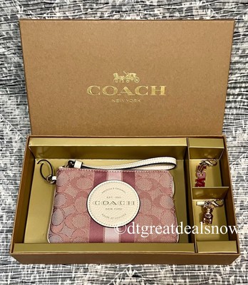 coach wristlet with charms