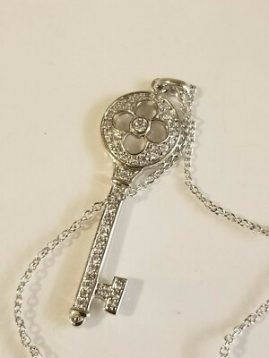 Sterling Silver Key Necklace with White Topaz Accents