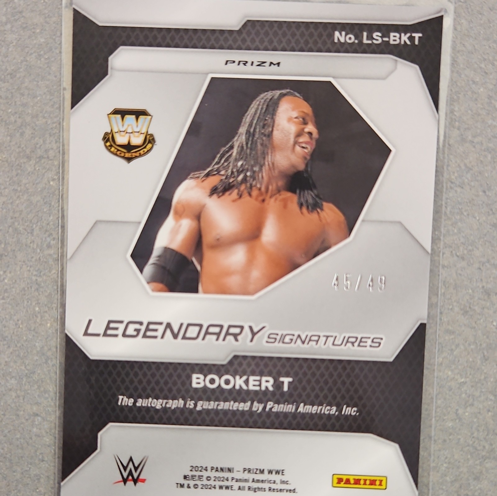 Panini 2024 Prizm WWE Booker T Legendary Signatures Blue Prizm Auto /49 view 6