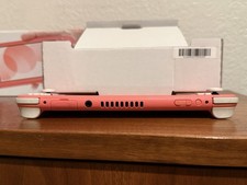 Nintendo Switch Lite Coral + Animal Crossing