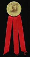 1904 W.R.C. Pinback Aide Women's Relief Corp 1 1/4" con cinta de 3"