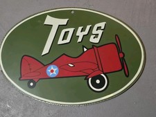Vintage 1990's Toys WWII Red Airplane 16x11 Oval Shape Metal Sign Wall Hanger NR