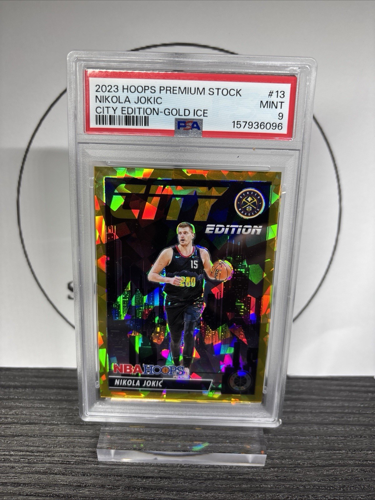 2023-24 Premium Stock Basketball - Nikola Jokic City Edition Gold Ice /10 PSA 9