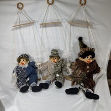 3 Vintage Clown Marionettes Hanging On Swings
