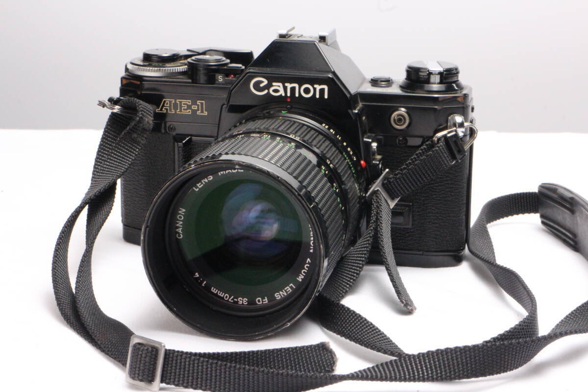 Canon AE-1 35mm SLR Film Camera black FD 35-70mm F4 lens Canon AE-1 35mm SLR Film Camera black FD 35-70mm F4 lens