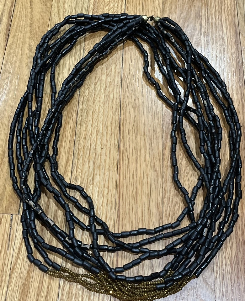 Collar de cuentas doradas RARA Avis By Iris Apfel negro con cuentas de madera brillante