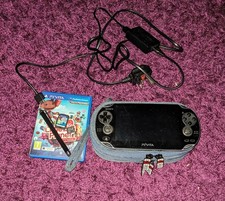 Sony PS Vita OLED(PCH-1003) Bundle - LittleBigPlanet, Case, Charger, Memory Card