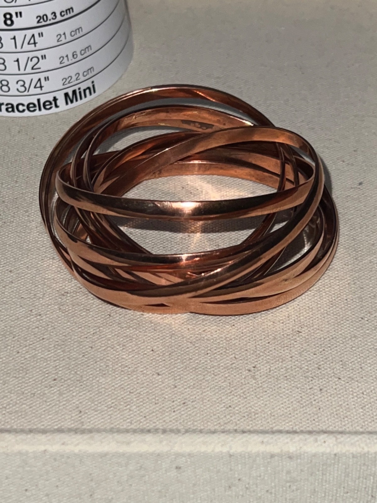 Nine Interlocking Solid Copper Bangle Bracelets - image 1