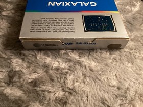Mint condition cartridge of Galaxian Atari 5200 1981 complete with overlays