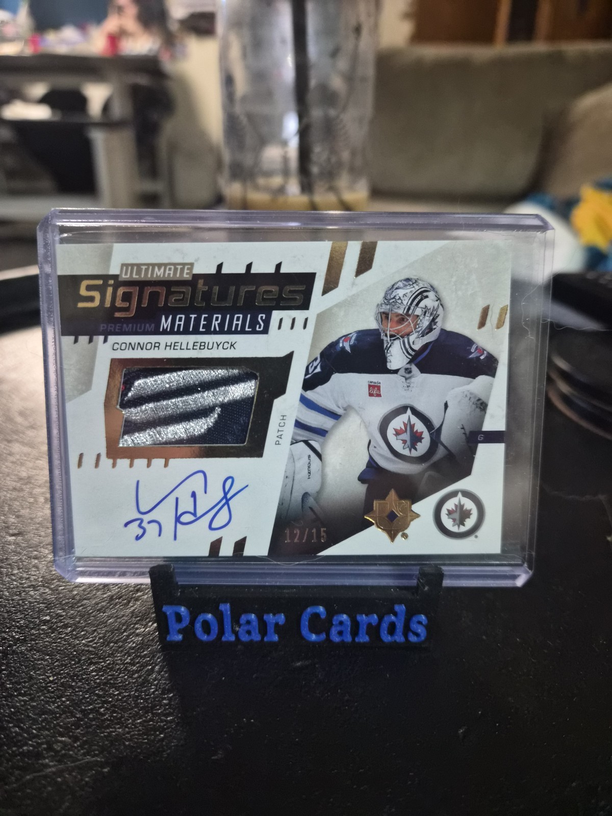 Connor Hellebuyck Premium Patch Auto /15
